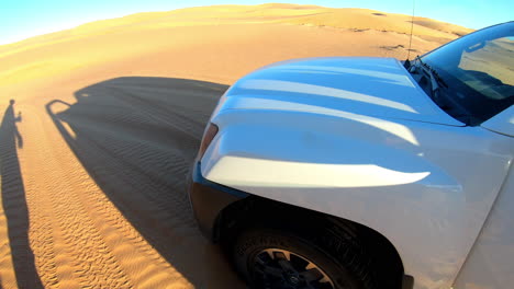 car stuck in the sand in the desert, wahiba sand, oman