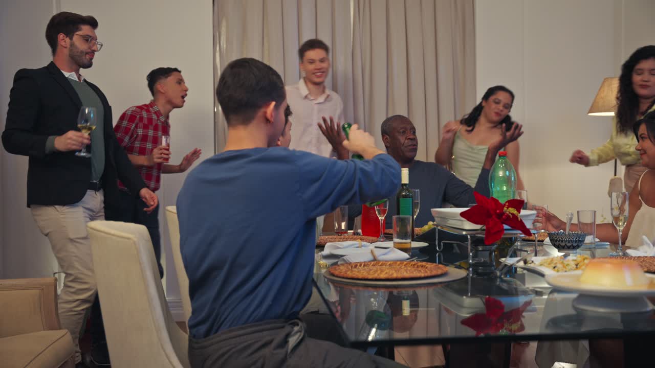 Friends and Family Enjoying a Lively Dinner Party at Home