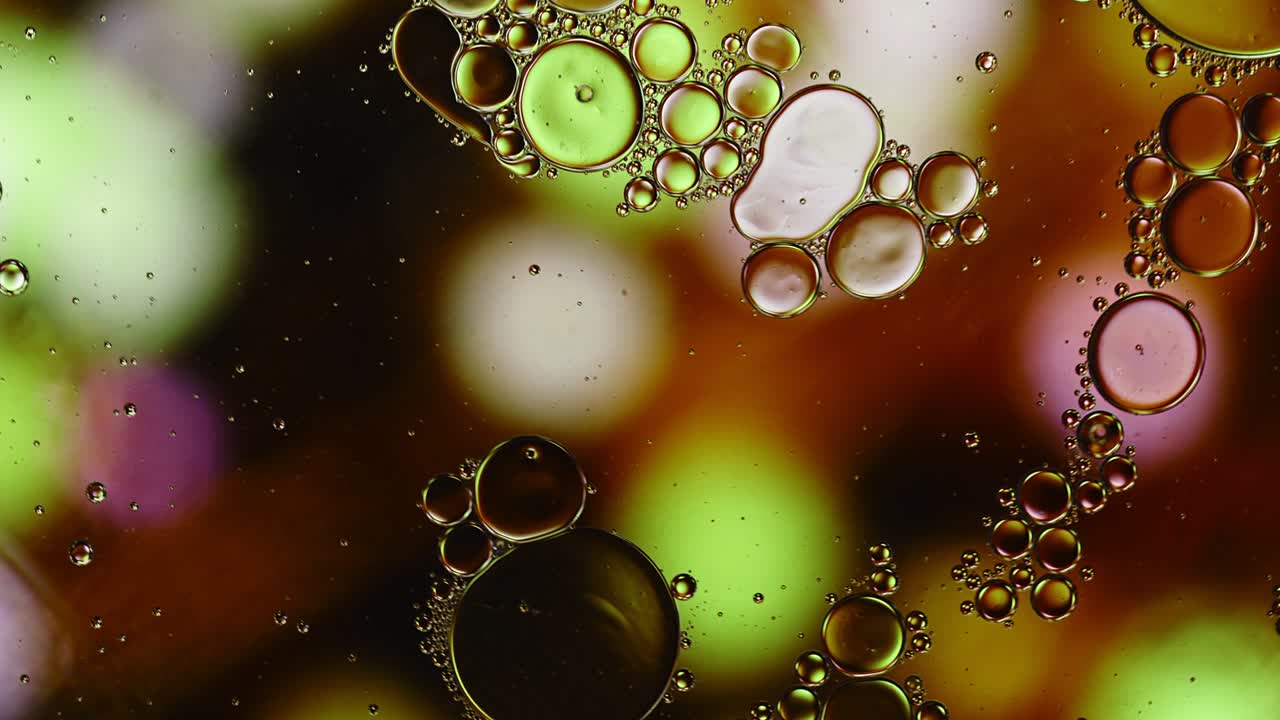 abstract colorido alimentos gotas de aceite burbujas y esferas que fluyen