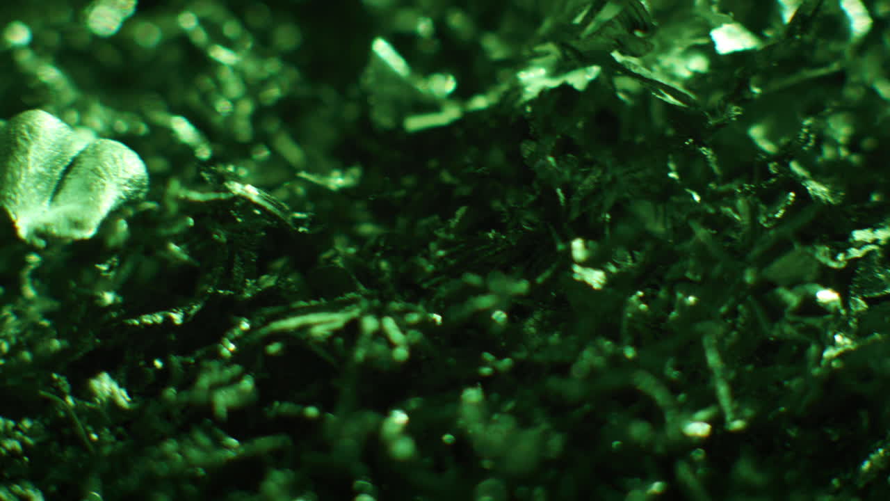 Emerald color metal fillings close-up shot