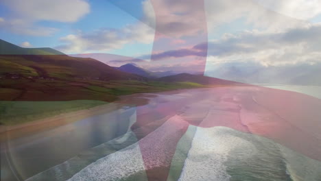 animación de la bandera de inglaterra soplando sobre las olas en el mar