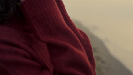 Closeup-fashionable-girl-posing-on-sea-shore.-Girl-enjoying-sunrise-at-beach