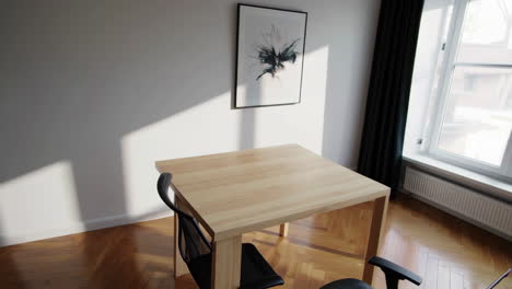modern office space with wooden desk and two chairs
