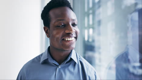 Business,-window-and-thinking-with-black-man