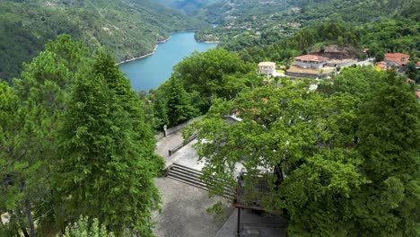 Aerial-View-of-Capela-de-Nossa-Senhora-da-Conceição,-a-Charming-Church-in-Gerês-National-Park,-sunny-day