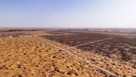 aerial establishing shot of the vast sand dunes at tengger desert, china