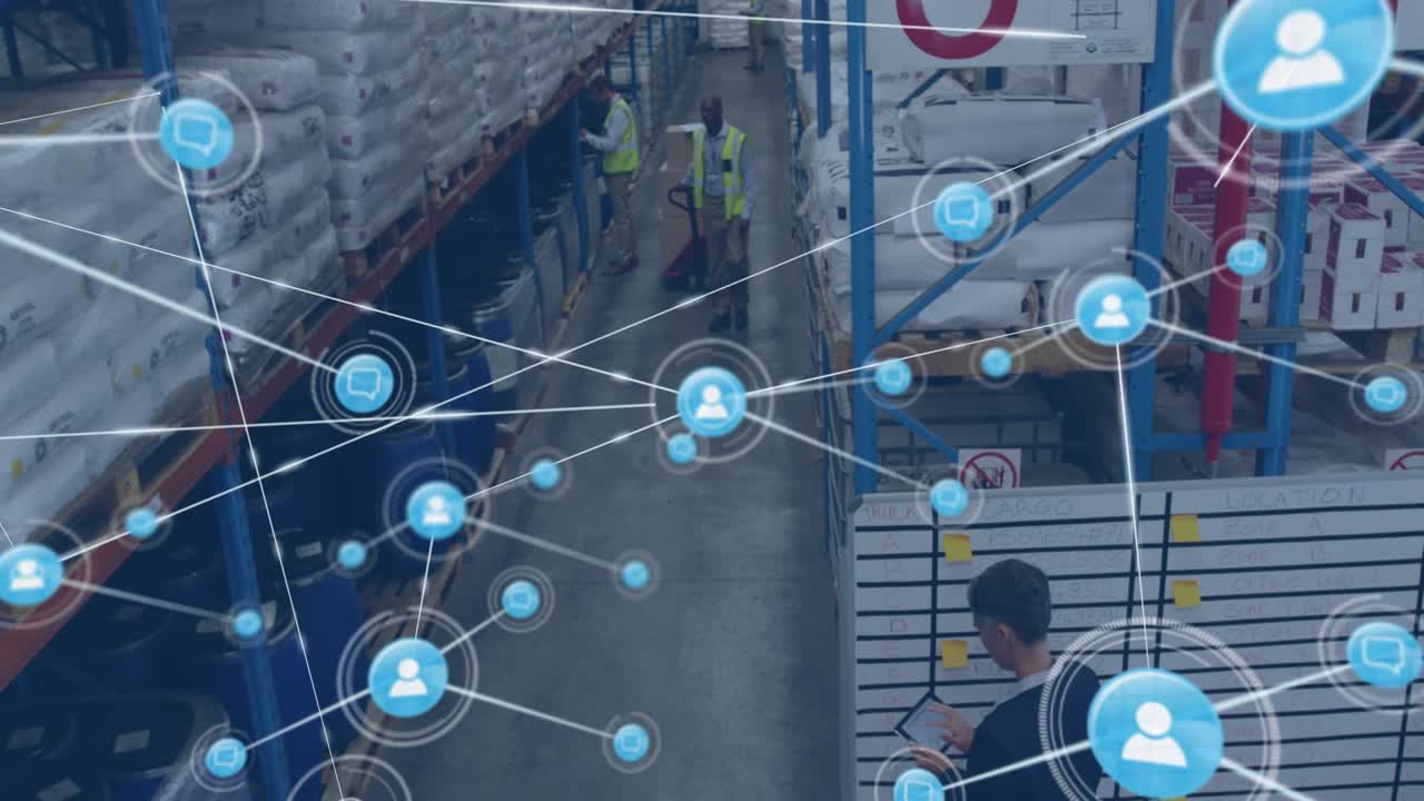 Warehouse worker pushing pallet truck and manager tapping tablet initiating digital network overlay