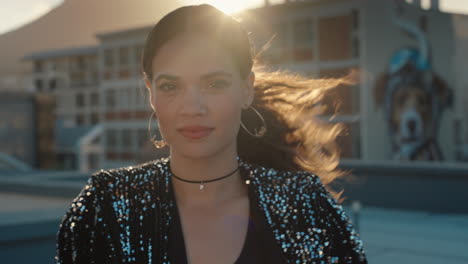 portrait beautiful woman in city looking confident with wind blowing hair at sunset female positive self image concept