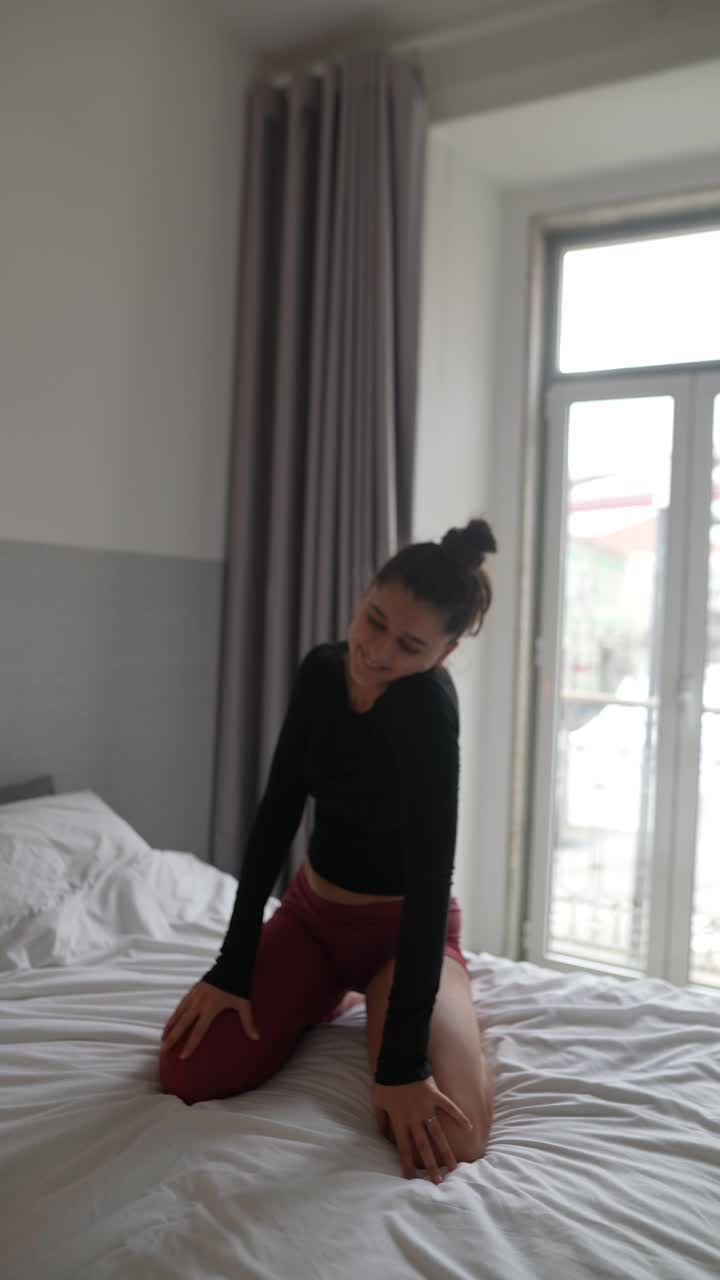 Woman Exercising in Bedroom