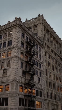 a close-up view of a tall, ornate building in the city