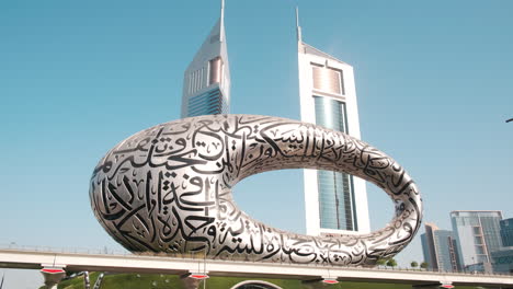museum of the future and the emirates towers skyscrapers, metro train