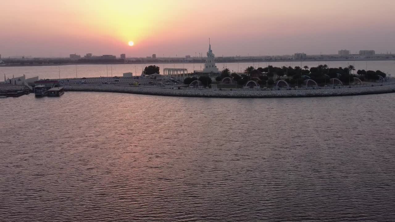 Murjan island during sunset in aerial drone flying back view