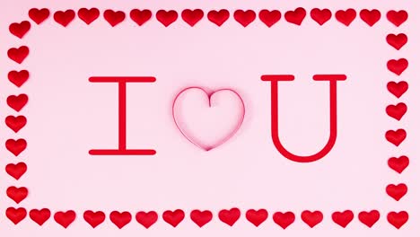 i love you text appear in frame of hearts. valentine's day stop motion