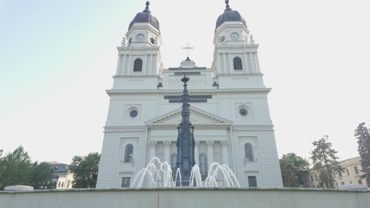 Catedrala Trei Ierarhi in Iasi, filmed in slow motion with artesian fountain in foreground