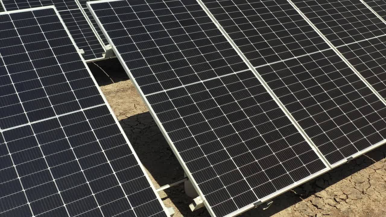 close up view solar panel and absorbing sun rays and produce clean and green energy.4k video