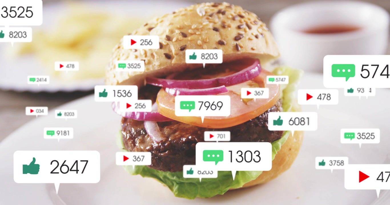 Incoming icons flooding and clustering around burger, scaling and indicating high engagement