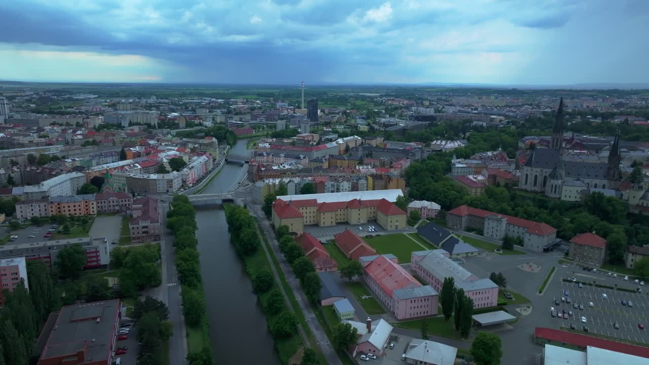 The city of Olomouc from a bird's eye view. A thriving historical city with a flowing river and the hustle and bustle of a big city. Drone view