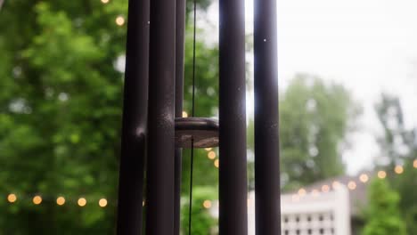 static shot of a wind chime flowing in the wind during the day