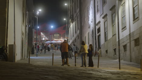 night scene in an urban alleyway with people