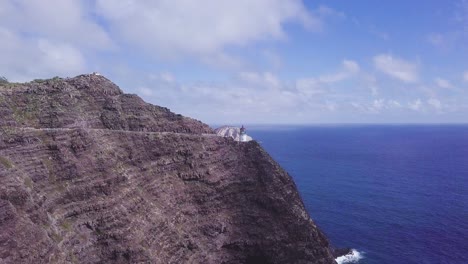 aerial shot over makapuu lighthouse in east honolulu hawaii - trucking aerial