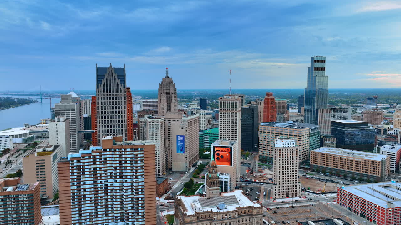 Detroit, USA, 28 July 2025: High-rises of contemporary Detroit, Michigan, USA. Overcast sky over the city at dusk time. Aerial view