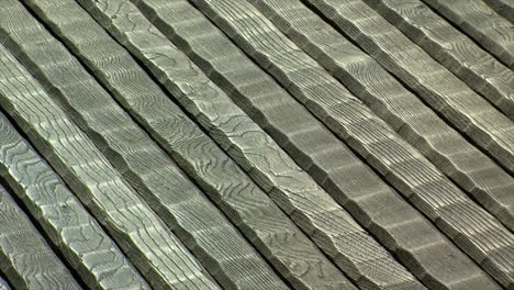 Close-up-of-rustically-carved-wood-on-porch-of-Japanese-house