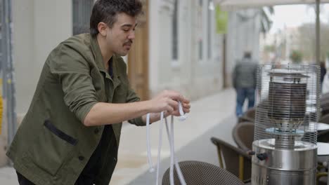 street magician performing rope trick