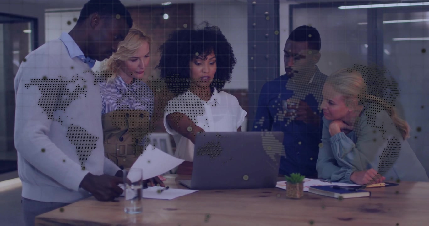 Presenter pointing at laptop initiating business discussion with animated charts as others nodding