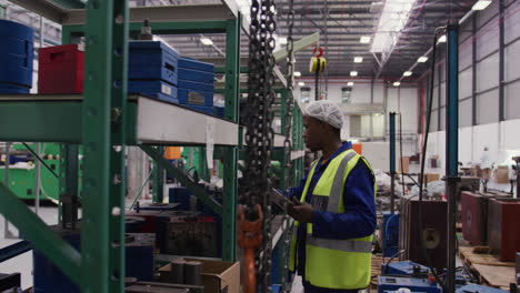 warehouse worker using a digital tablet