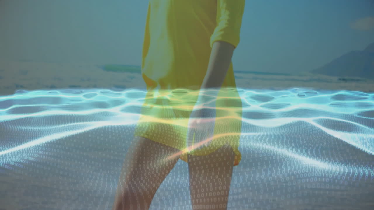 Person in yellow dress standing over digital wave animation with binary code