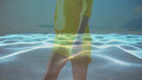 person in yellow dress standing over digital wave animation with binary code