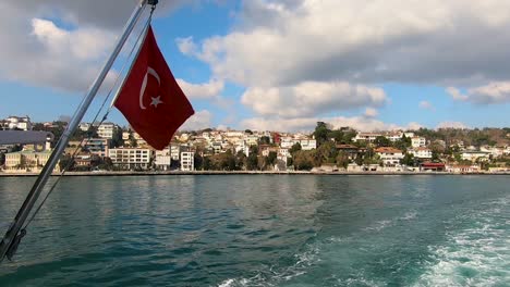 istanbul ferry flag on back of boat
