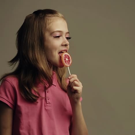 girl with lollipop candy