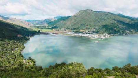 aerial view of small town of havelock nestled by the waters edge at head of pelorus sound in marlborough sounds, with calm, sheltered bay in the south island of new zealand aotearoa