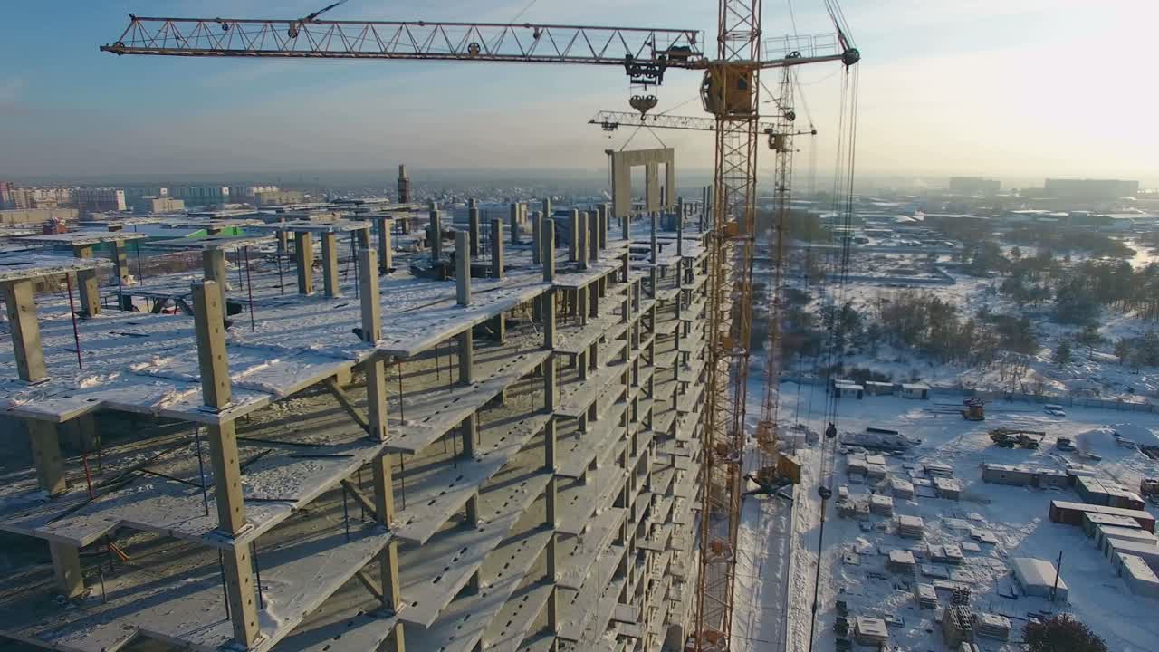 Aerial View of High-Rise Building Under Construction in Winter