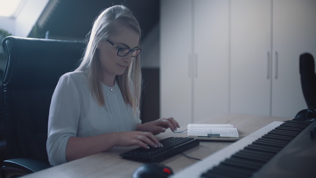 Smiling woman works remotely from home