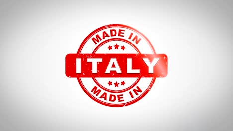 made in italy signed stamping text wooden stamp animation. red ink on clean white paper surface background with green matte background included.