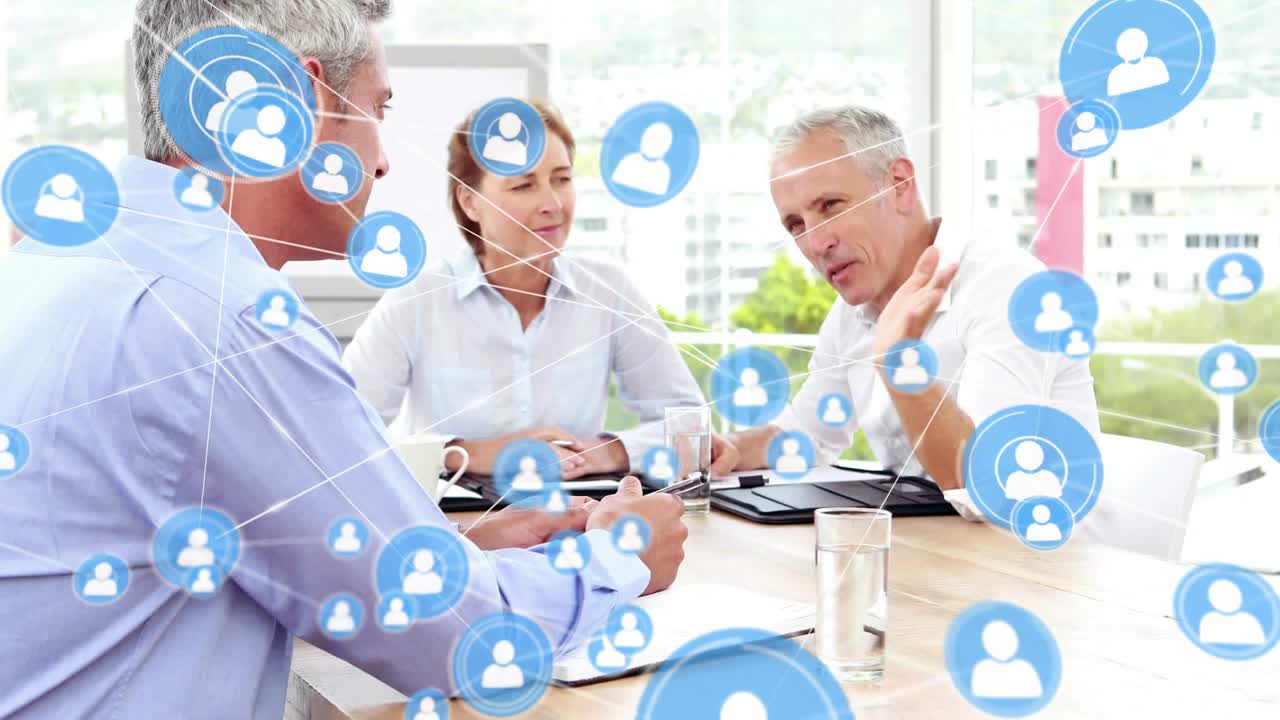 Left man speaking, starting blue nodes growing and linking in business meeting showing network