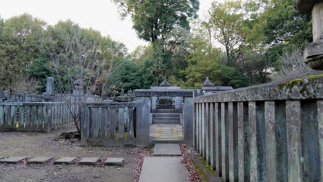 in japan, the deceased are cremated and their ashes are placed inside stone gravestones dedicated to the family