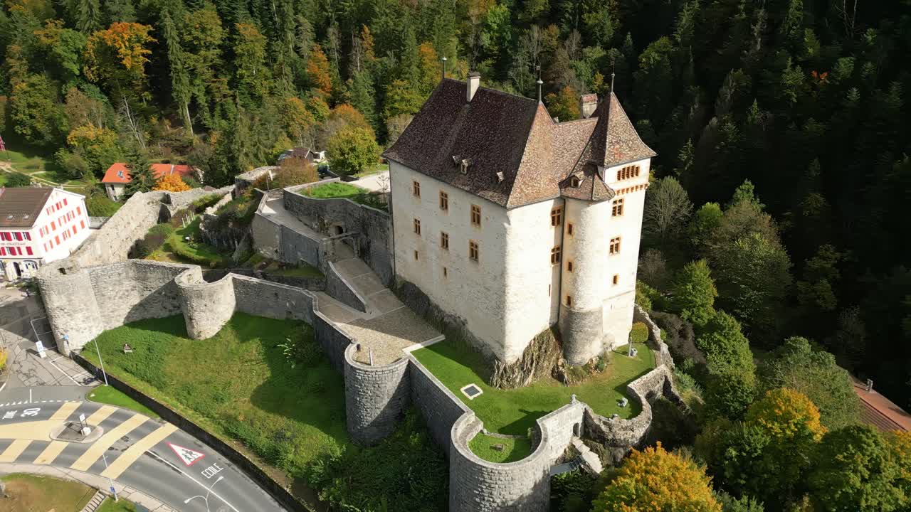 Orbit drone shot close to Valangin Castle in Canton of Neuchatel Switzerland