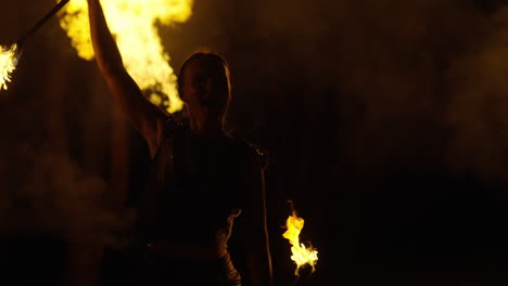 Fire Juggler Performance at Night