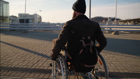 man in wheelchair outdoors