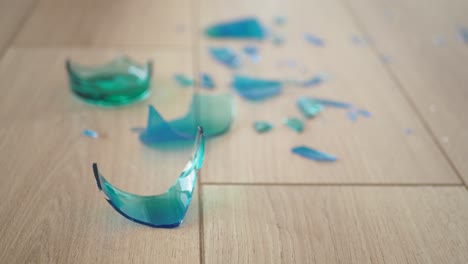 broken glass on wooden floor