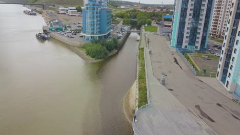 just married couple on viewpoint at waterfront upper view
