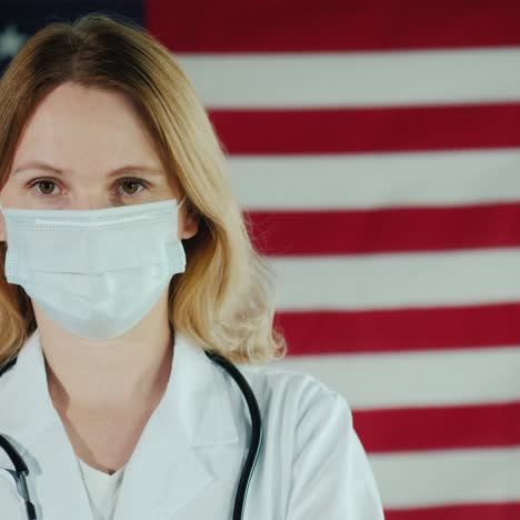 Portrait-Of-A-Masked-Woman-Wearing-A-Us-Flag