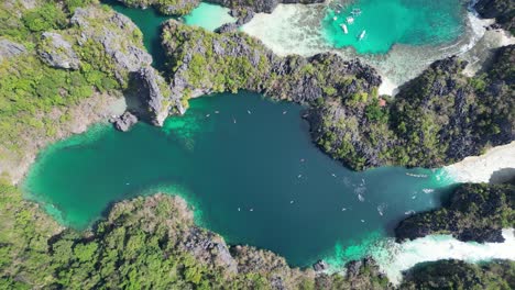 small and big lagoon in el nido, philippines, sliding drone top-down