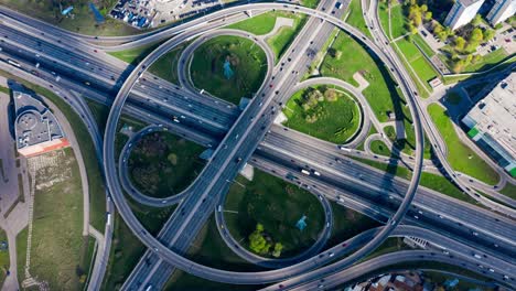 timelapse aerial view of a freeway intersection traffic trails in moscow.