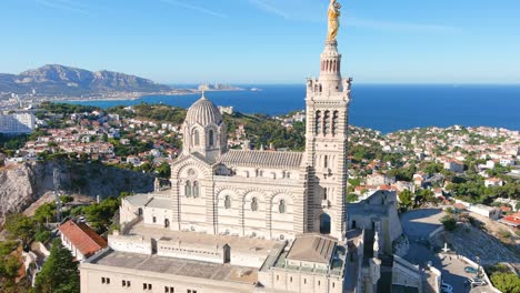 marseille: aerial view of city in france, basilica basilique notre-dame de la garde (la bonne-mère) on top of hill - landscape panorama of europe from above