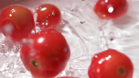 Slow-motion-fresh-tomatoes-shower-water-cleaning-Concept-It-looks-optimistic-and-healthy