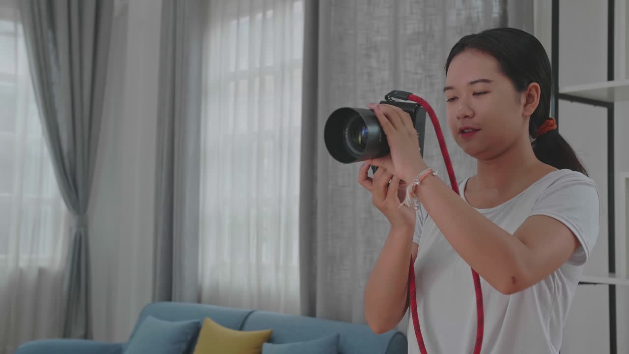 Woman taking photos indoors